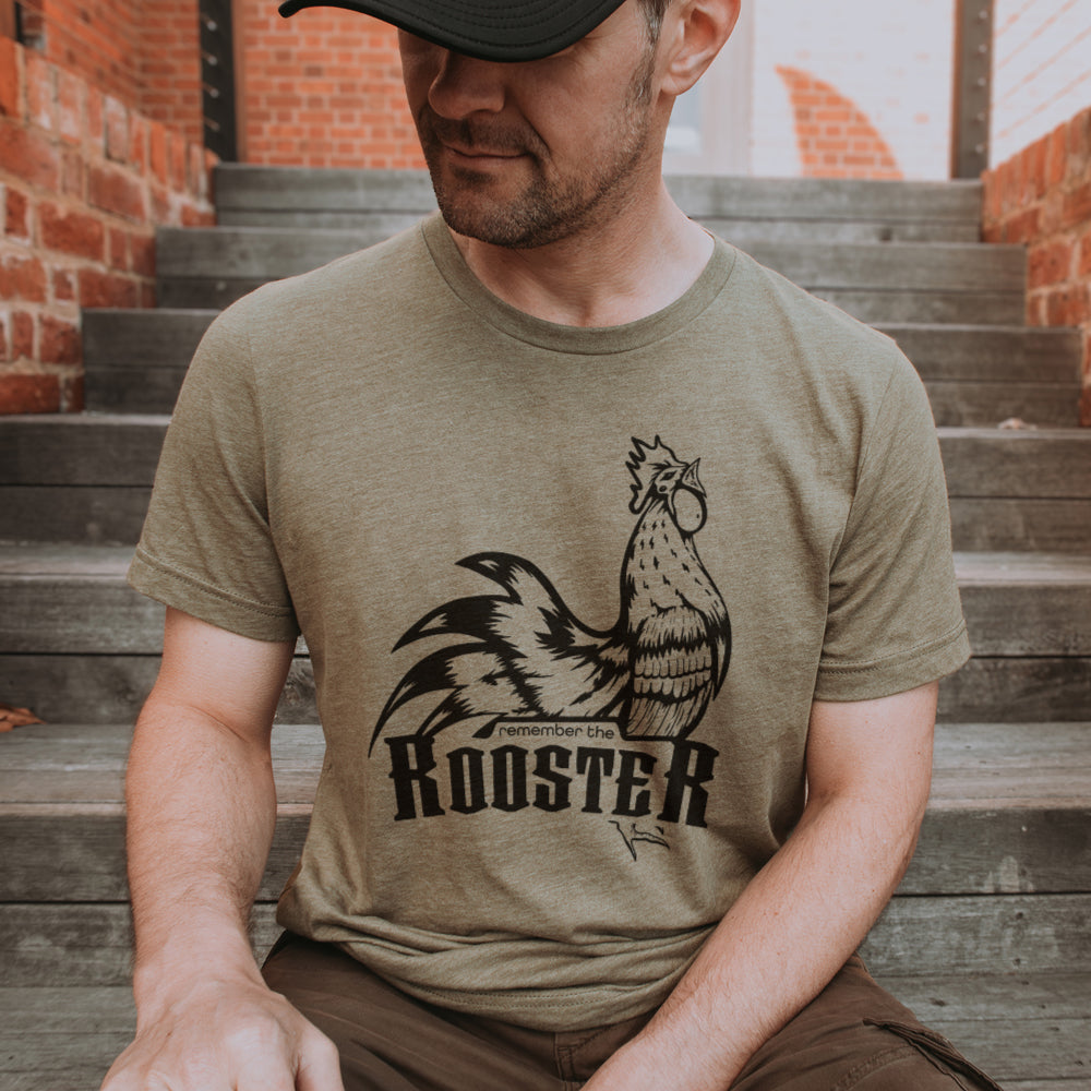 Strong man wearing remember the rooster christian t shirt