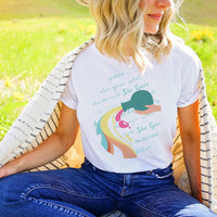 blonde wearing she gave what she could christian t shirt in a grass field